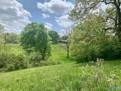 A view of one of the barns from a field.