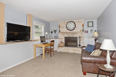 Large family room with pretty faux painted brick f