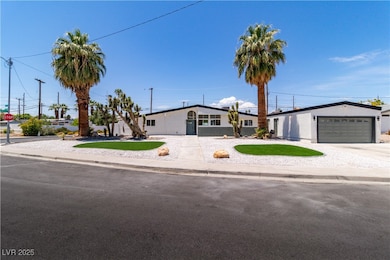 Single story home featuring an attached garage, co