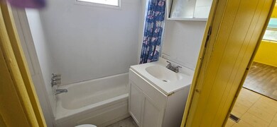 Full bathroom with tub