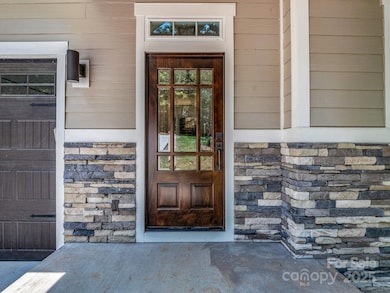 Front door with transom window for added natural light