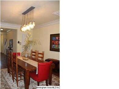 Dining area with a eye catching light fixture