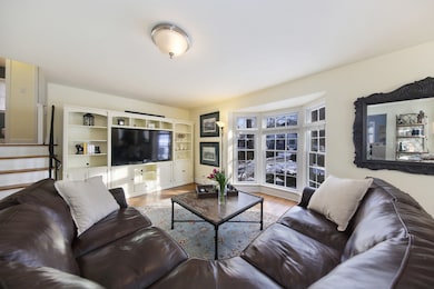 Sunny bay window. Hardwood floors.