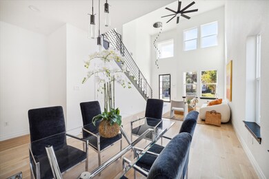 This is a bright, modern dining space featuring hi