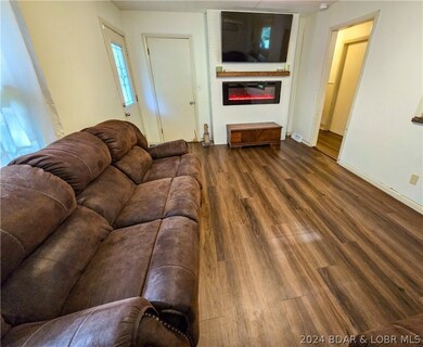 Living room with built in fireplace