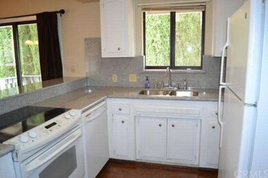 A brand new sink, new faucet, new granite counters