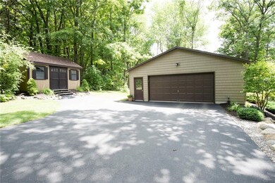 2.5 car garage and shed, plenty of parking