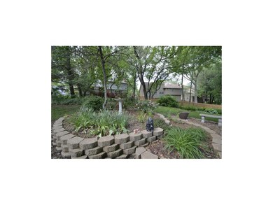 Lovely landscaped back yard...green space is to th