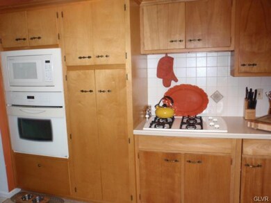 Updated kitchen with gas counter top range, eye le
