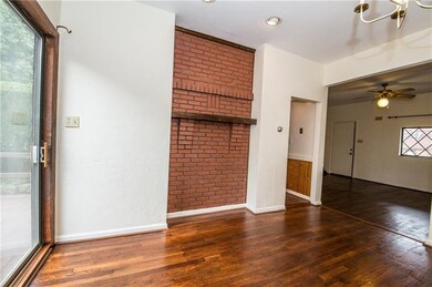 Sliding glass doors in the dining room open to the