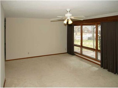 LARGE LIVING ROOM WITH OVER-SIZED WINDOWS - 23.8 X
