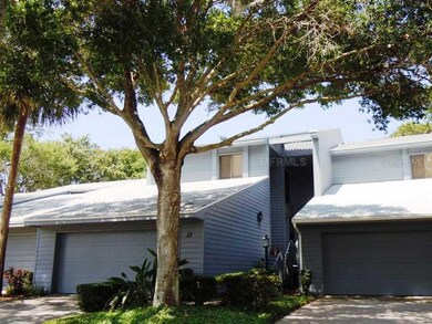 Exterior Front - One of only 4 condo townhouses in Mariner Village with 3 levels of living and 3 levels of lanai overlooking the marina views.