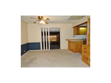 Adjacent to the living room is the dining area whi
