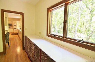 Keeping room, just off kitchen and leads to the fo