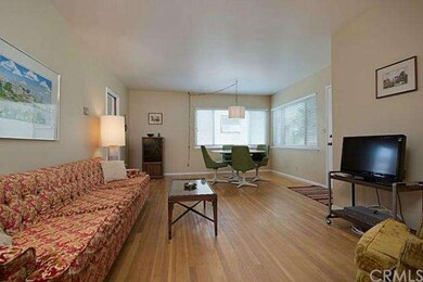 Spacious living room and dining area with an abund