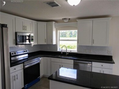 1584 SW Abacus Ave, Port Saint Lucie, FL 34953 - photo 4