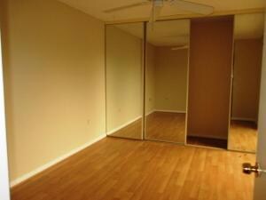 guest bedroom, laminate floors