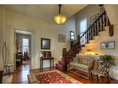 Entry. Spacious entry hall with Dudley Newton sign