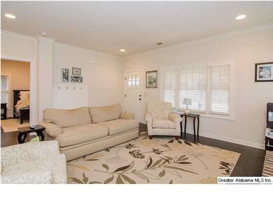 The living room overlooks the large front porch.
