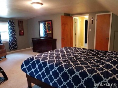 Large second floor bedroom.