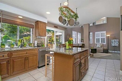 The remodeled kitchen is open to the comfortable f