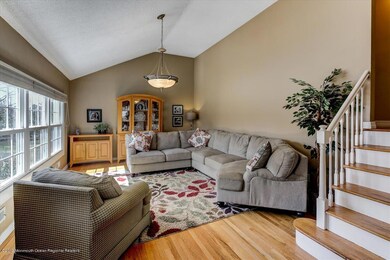 LIVING ROOM WITH VAULTED CEILING
