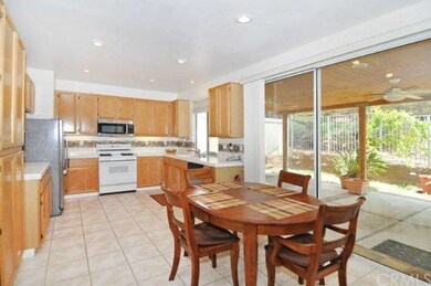 Large sliding door opens to covered private patio 