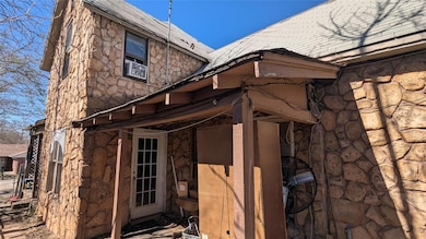 View of home's exterior featuring stone siding