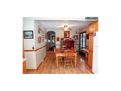 The kitchen opens into a 10 x 10 dining area that 