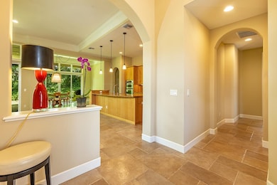 The entry hall creates a graceful transition