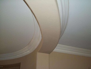 CROWN MOLDING IN FOYER & FAMILY RM