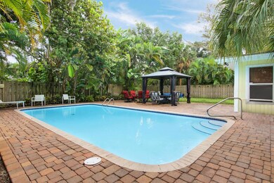 15x30 Pool in Tropical Setting