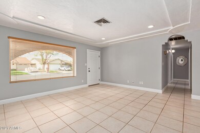 living room front window and hallway