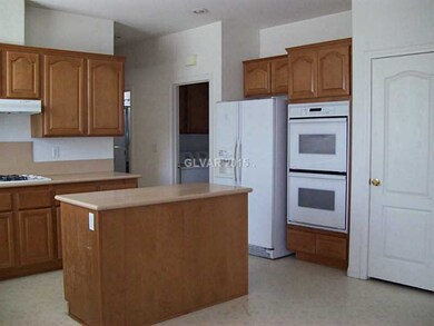 Property Photo. Double built-in ovens and side-by-