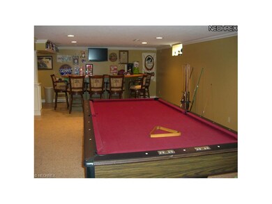 The finished basement has a beautiful bar, a full 