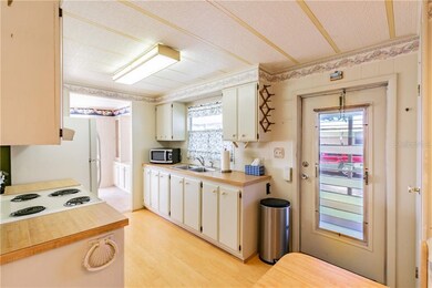Kitchen/ Entry Door.