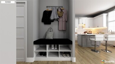 Mudroom with light wood finished floors