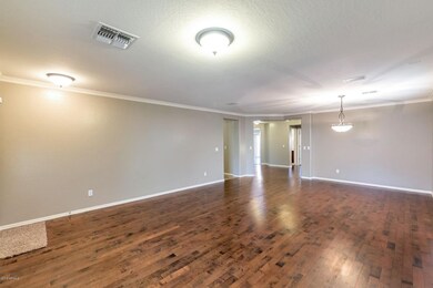 living room has wooden floors