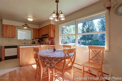 Otter Dining & kitchen with lots of natu