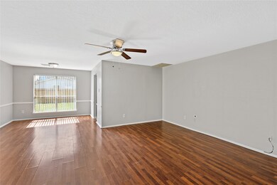 This room is large and the kitchen sits just behin
