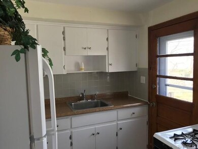 stove and refrigerators in both units.