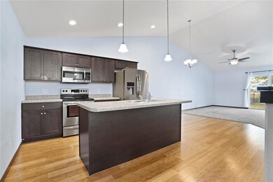 Entry flows right in to open concept kitchen with 