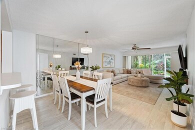 Dining space with light wood-style floors and ceiling fan