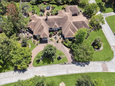 Privacy abounds with a myriad of lush landscaping