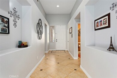 Nice Wide entryway with Custom Tile flooring