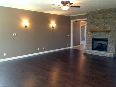 The spacious Great Room features a gas fireplace, 
