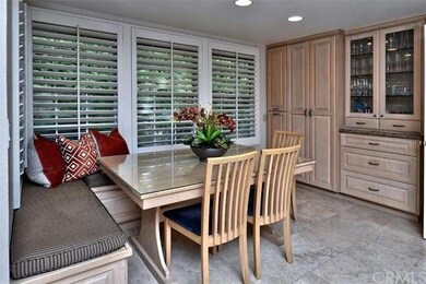 Breakfast nook with banquette and matching table a