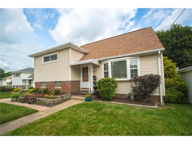 Great curb appeal with beautiful landscaping and n