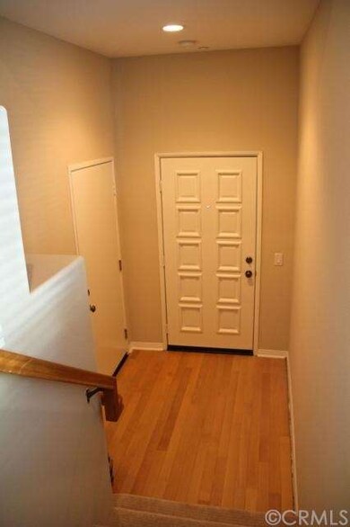Welcoming entry with access to the two-car garage.