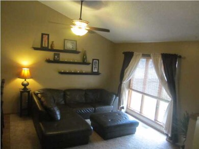 Inviting living room on main floor open to kitchen